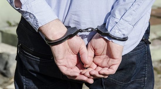 Skipping bail, man in handcuffs, Tampa FL